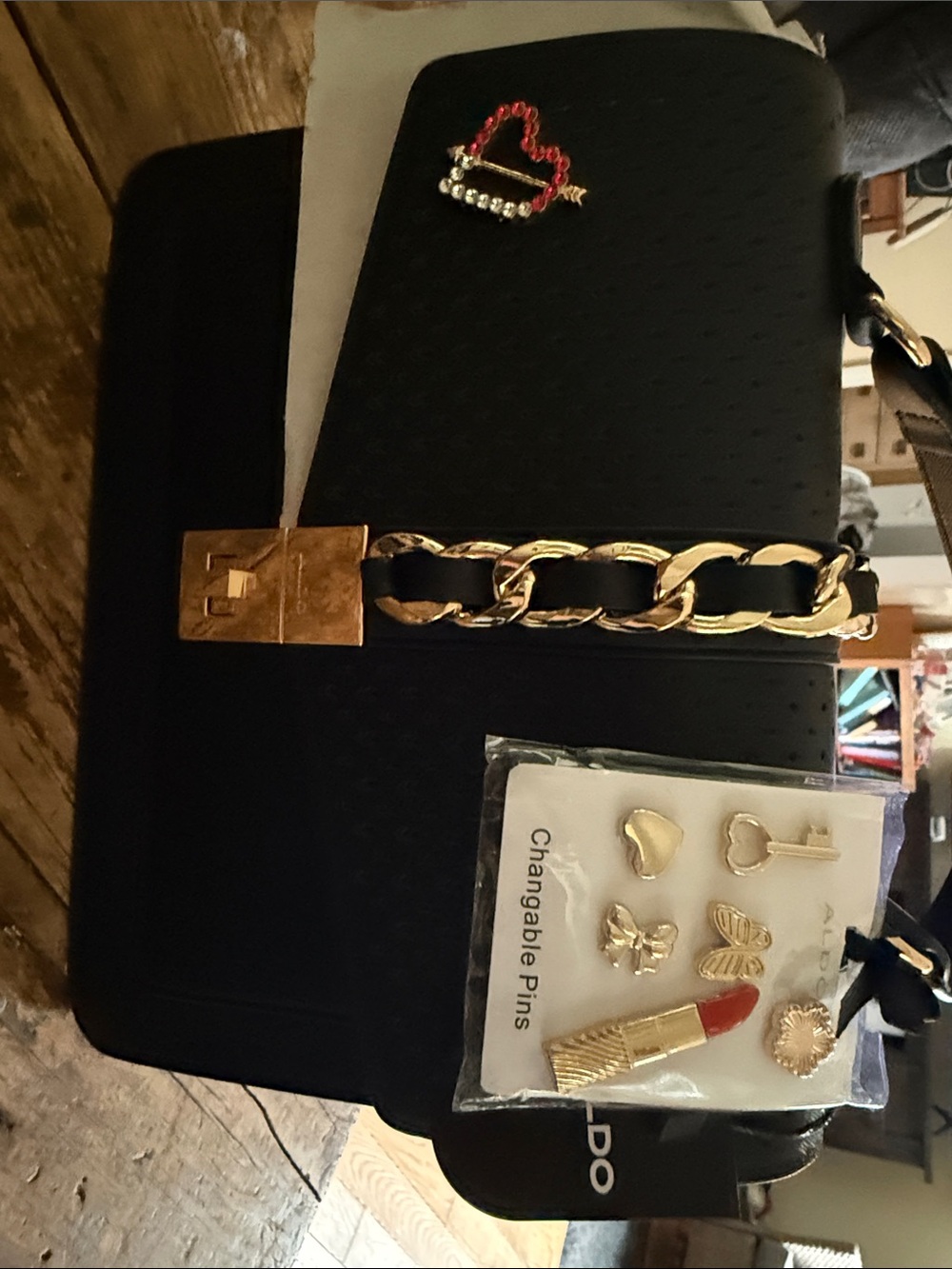 Aldo Black Crossbody Bag with Gold Chain Accent